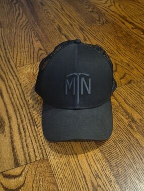 NWOT!! Mountain Hardwear Black Trucker Hat with Raised Ice Axe Logo